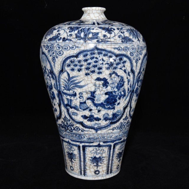 This striking vintage porcelain vase is crafted in the classic Meiping (plum blossom) silhouette, with a broad shoulder...