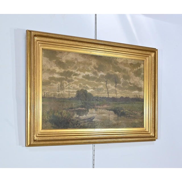 Work by Cheret depicting a landscape featuring a stream surrounded by fields and woods. Under a cloudy sky, a fisherman...