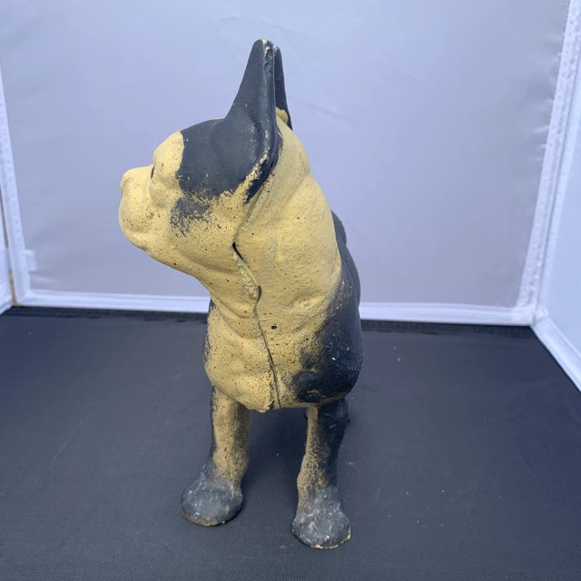 Beautiful, sturdy, molded doorstop with such character, look at that face!Cast iron doorstop in the shape of a French...