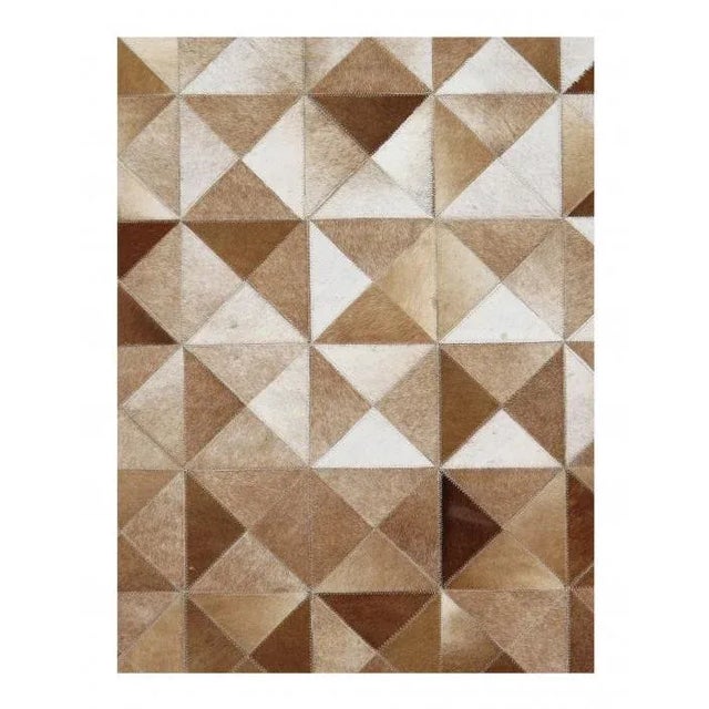 Hand-stitched by skilled artisans. These rugs are given a unique texture and subtle shifts in color with the use of...