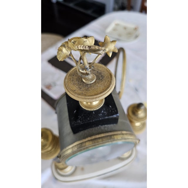 Rare18th Century White and black marble and gilt An exquisite 18th Century Louis XVI mantel clock crafted in ormolu and...