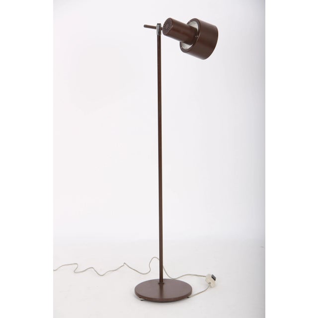 Jo Hammerborg design. Brown floor lamp of steel and aluminum. Good condition with normal signs of wear. Produced by Fog &...