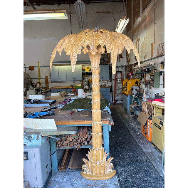 Magnificent, very large, hand-carved vintage wood palm tree floor/wall lamp. Two bulbs are hidden behind the fronds,...