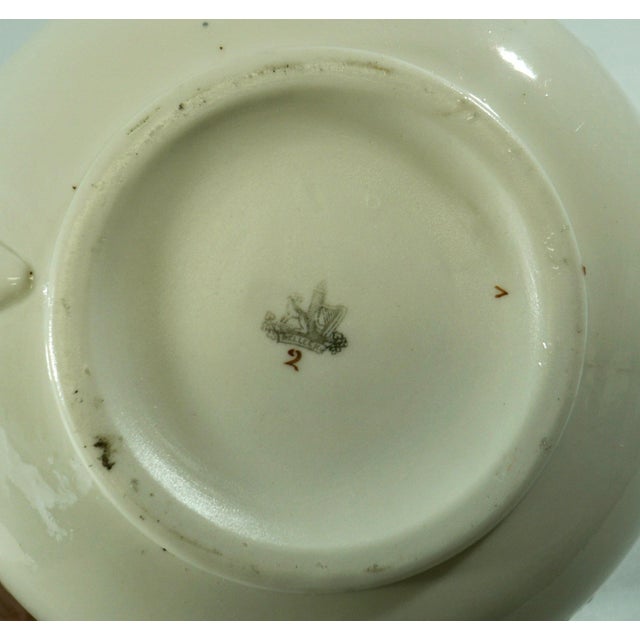 A rare and beautifully preserved antique Irish Belleek teapot bearing the coveted First Black Mark, dating this piece to...
