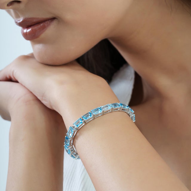 Art Deco Style 26.1 Ct Emerald Cut Blue Topaz Line Tennis Bracelet in Sterling Silver For Sale - Image 6 of 12