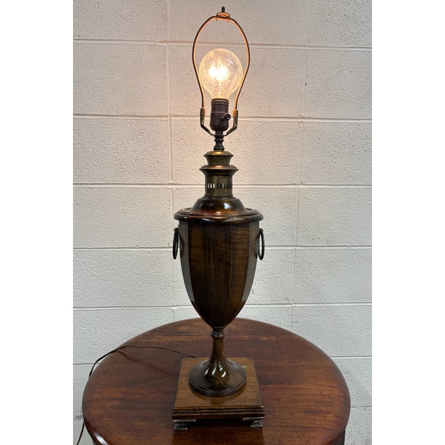 This is a vintage Frederick Cooper Chicago mahogany urn table lamp, likely dating to the mid-20th century, circa...