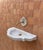 A beautifully sculptural hand-carved Indian marble wall-mount sink, designed with a soft, organic silhouette that brings...