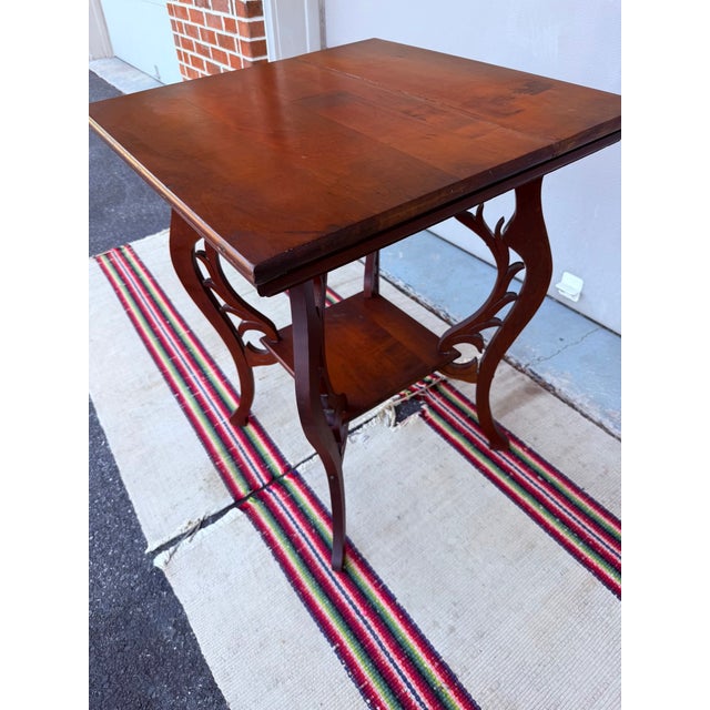 Antique Victorian Cherry Tabouret Table with Reticulated Fretwork, Circa 1890-1910 Description: A charming antique...