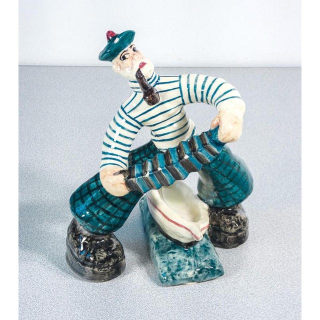 Ceramic sculpture of a sailor with an accordion, c.a.s.a. Manufacture by zulimo aretini. Cameri, 1950s origin cameri,...