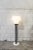 Earth lamp with iron structure, glass lampshade and marble base. Italian production 70's European Plug (up to 250V).The...