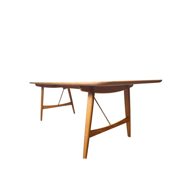 Designed in 1950 for the Copenhagen Cabinetmakers' Guild Furniture Exhibition, the Børge Mogensen BM1160 Hunting Table...