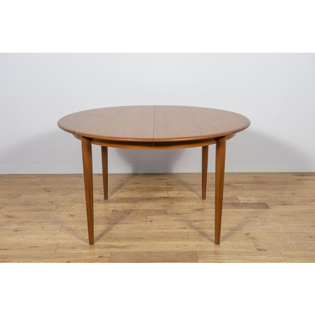 The table produced in the 1960s in Denmark by Skovmand & Andersen. The tabel made of teak with a light form and...