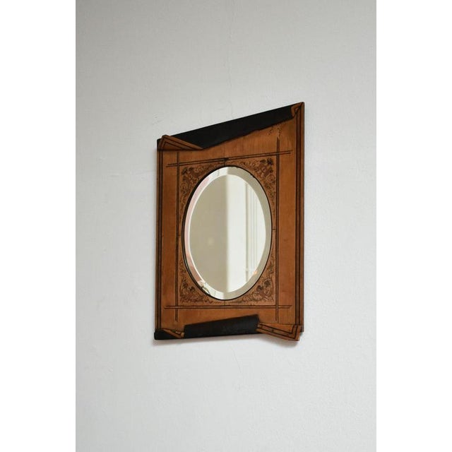 Wooden edges simulating folds mirror, XIXth c. Trompe l'oeil Mirror with edges simulating folds, decorated with marquetry...