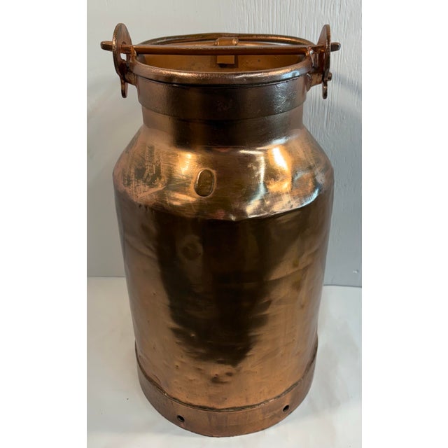 Gorgeous copper milk can from France. Has a locking hinge mechanism for easy handling. Makes a great umbrella stand or...
