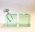 Pair of rare MCM ice block bookends by Curtis Jere. Made of heavy glass with 1 metal chrome tong The cubes measure 5” With...