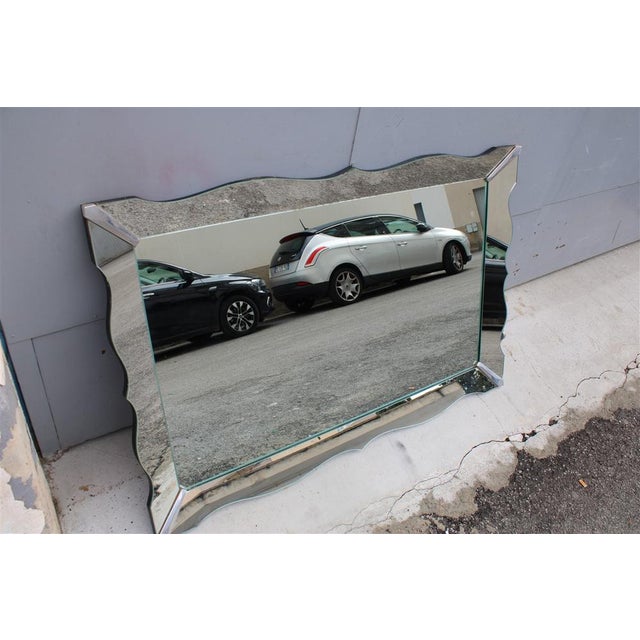 Large Vintage French Scalloped Mirror, 1960, in Very Good conditions. Designed 1960 to 1969 This piece has an attribution...