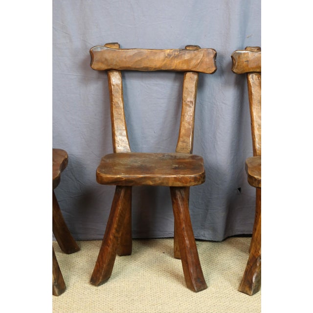 Set of four Brutalist-style chairs. Note a few minor signs of woodworm. DIMENSIONS: 0.83m high, 0.39m wide, and 0.40m deep.