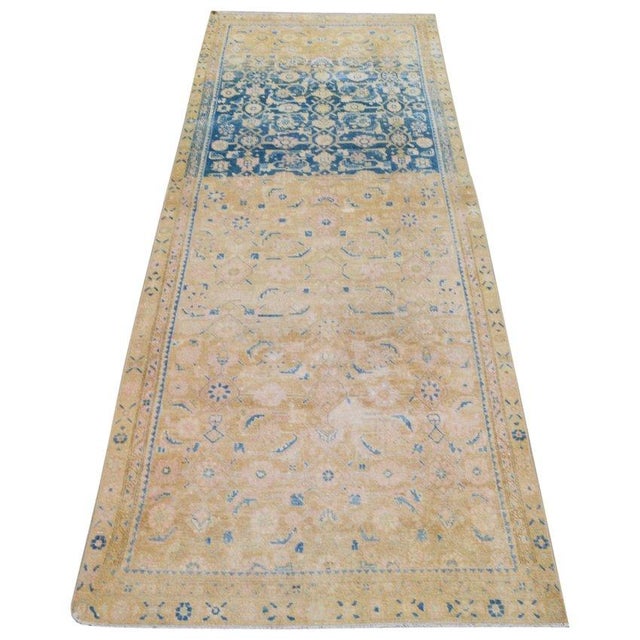 Hand-knotted with care using traditional rug-making techniques, this wool rug blends timeless craftsmanship with a modern...