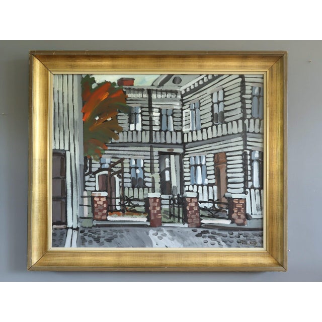 FACADE IN FOCUS Size: 28.7 x 33.9 inches (including frame) Oil on canvas A striking street scene that depicts a...
