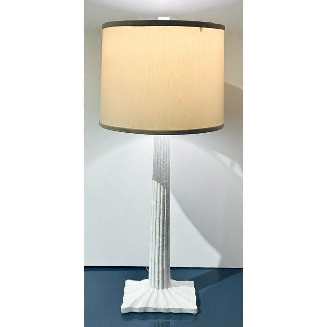 Stylish Modern Tapered Organic Fluted Matte White Table Lamp, light camel fabric shade, showroom floor sample