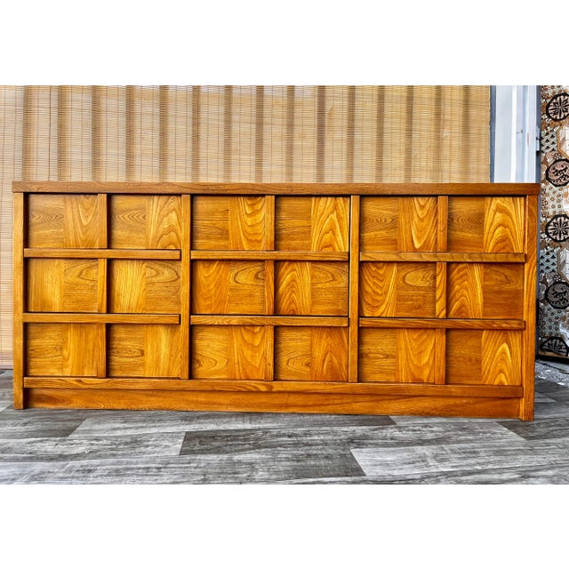 Vintage Mid Century Modern Chest of Drawers by Stanley Furniture. C 1970s. Features a brutalist inspired design, nine...