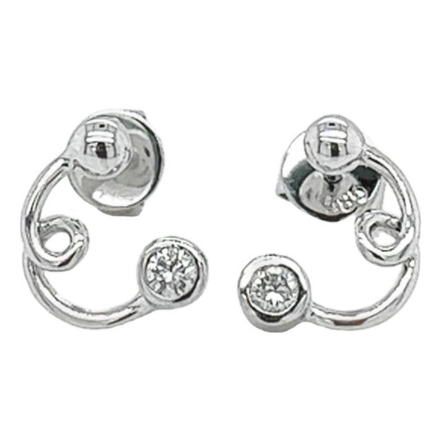 14k White Gold Swirl Earrings With Round Bezel Set Diamonds, Pair For Sale
