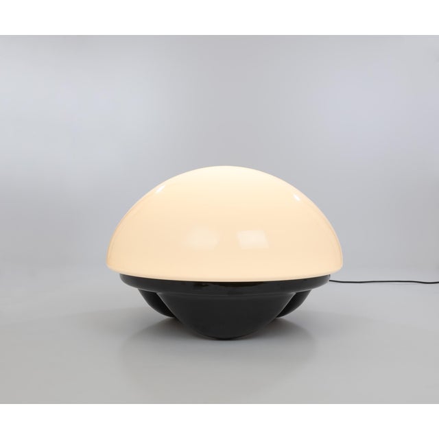 Isotta table lamp, designed by E. Gentile and manufactured by Sormani's Nucleo division, 1970s. The glass dome with a...