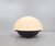 Isotta table lamp, designed by E. Gentile and manufactured by Sormani's Nucleo division, 1970s. The glass dome with a...