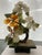 Vintage miniature Chinese jade tree with pale off white blooms with coral seed centers accented with a big carnelian...