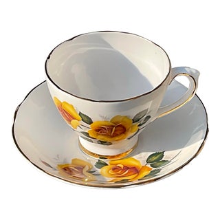 1930s Delphine Teacup and Saucer With Yellow Roses For Sale