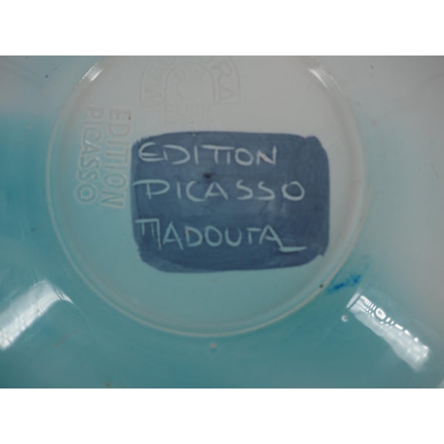 Pablo Picasso (1881-1973) and Atelier Madoura Toros, July 29, 1952 Turned white earthenware plate decorated with slips and...