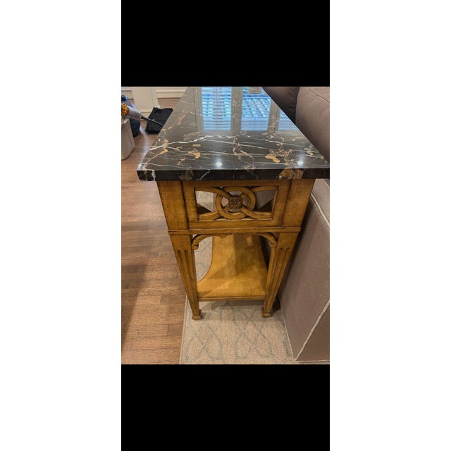 Century wooden console or sofa table with marble top. Stretcher at bottom