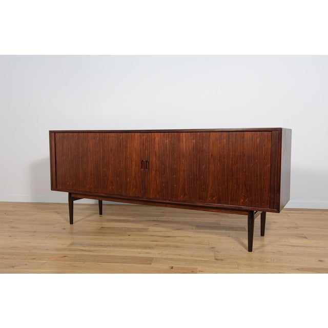 A unique Model 37 sideboard designed by Arne Vodder, produced in the 1960s in the Danish Sibast factory. Sideboard has an...