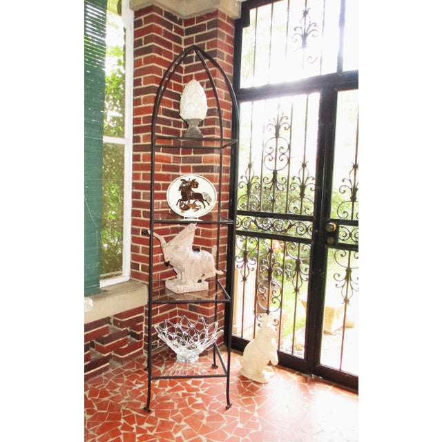 This is a Magnificent! Vintage Regency Iron Framed Etagere with Plate Glass Shelving that has a Rounded Crown Top that is...