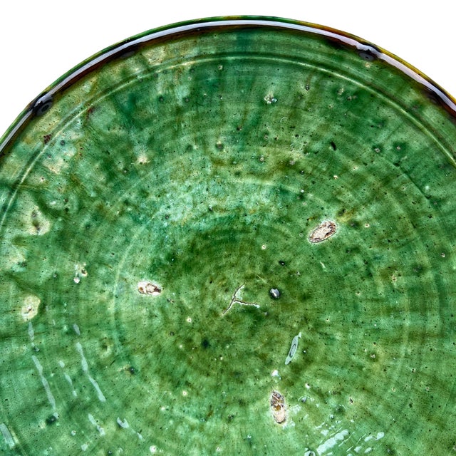 Handcrafted in southern Morocco, Tamegroute pottery is celebrated for its distinctive green glaze, organic forms, and...