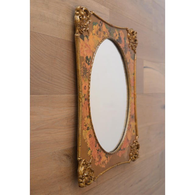 This rare Victorian style mirror is an eye-popping beauty with ornate baroque details in gold finish and a decoupage...