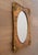 This rare Victorian style mirror is an eye-popping beauty with ornate baroque details in gold finish and a decoupage...