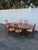 This classic Set of Dining Table and Six Chairs and 2 Leaves is made of wood, teak wood, veneer, and upholstery. The Table...