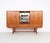 Unique vintage highboard from the 1960s, produced in denmark. this beautiful cabinet is finished with warm teak veneer and...