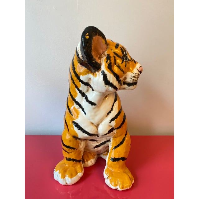 Excellent vintage condition with no chips or cracks; glass marble eyes. Has holes for whiskers but no whiskers present....
