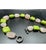 This necklace combines rose quartz and green turquoise beads in an alternating pattern, showcasing the natural beauty of...
