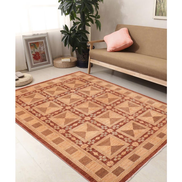 "Enhance the ambiance of your home with this magnificent Persian-influenced Turkish hand-knotted rug made by skilled...