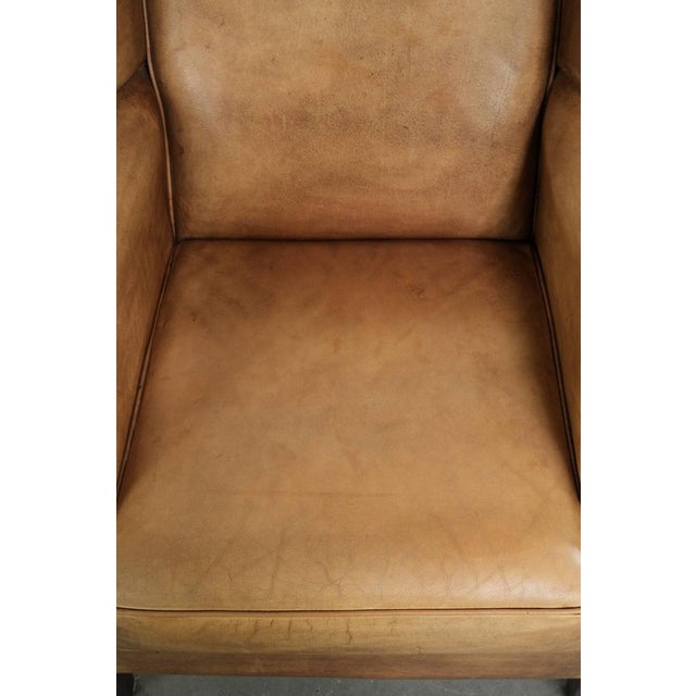 Light Cowhide Wing Armchair with a Timeless English Look and Good Seating Comfort For Sale - Image 6 of 14