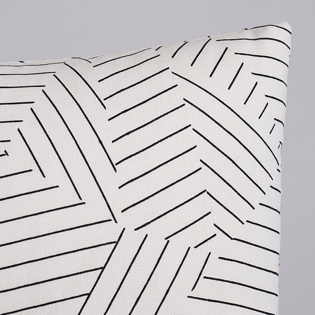 This pillow features Deconstructed Stripe by Miles Redd for Schumacher with a Self-Welt finish. This graphic collage of...