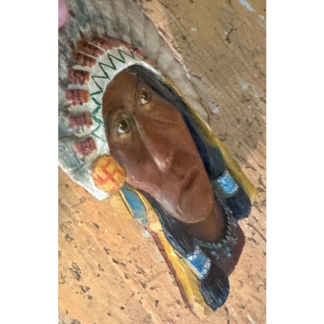 Early 20thc Hand carved & painted Indian chief wood plaque.