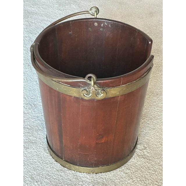 Handsome and rare brass bound mahogany plate bucket ca 1790. This was use in English country homes to warm plates by a...