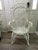 A lovely wicker peacock chair with fiddlehead design. Very ornate and decorative. This chair is perfect for patios,...