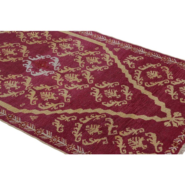 Hand-knotted in wool and originating from Turkey, circa 1880-1890, this 3x5 antique Kirsehir rug is an exciting, rare new...