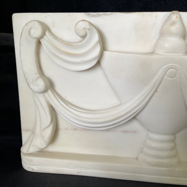 Antique hand carved alabaster or marble architectural fragment plaque panel with an urn with swag festoon decoration....