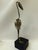This striking 11.5-inch mid-century modern mixed-metal sculpture depicts a stylized water bird (crane/heron) expertly...